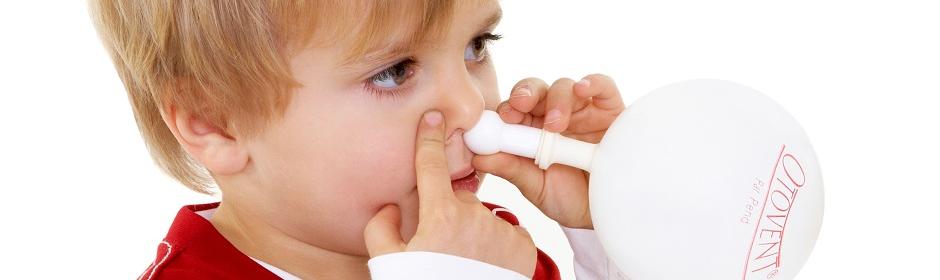 Boy inflating nasal balloon